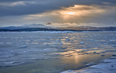 moody coastal winter landscape  near Gibostad  on Senja Island in northern Norway
