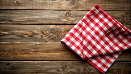 Red checkered tablecloth on rustic wood. Ideal country-style food photography background.
