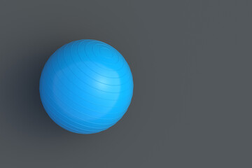 One fitness ball on gray background. Pilates training. Sports equipment. Bodybuilding accessory. Copy space. Top view. 3d render