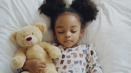 A little girl sleeping in bed soundly with her teddy bear while wearing a blanket, hugging it tightly and looking peaceful while in dreamland with a white background of her room