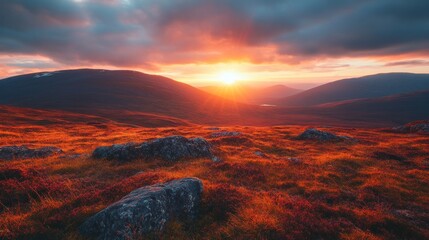 Dramatic Sunset Over Rolling Hills with Boulders and Vibrant Sky