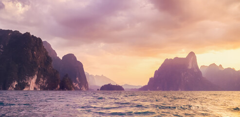 The Serene and Beautiful Landscape of Majestic Mountains and Vast Ocean at Sunset Hour, Thailand vacation Cheo Lan Phangan Lake Phuket island view