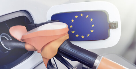 The flag of the European Union on the lid of the gas tank of a car at a gas station. High prices for diesel fuel, gasoline and gas at gas stations in Europe, shortage of combustible materials and fuel