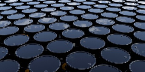 Fototapeta premium Black metal oil barrels with drop symbols outdoors storage from above