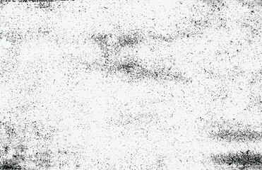 High-contrast grunge texture with black speckles and scratches on a white background. Perfect for overlays and vintage effects.