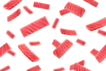 Falling raw Tuna, fish isolated on white background, selective focus