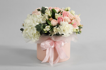 Bouquet of beautiful flowers on grey background