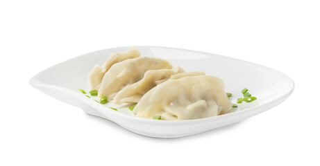 Tasty boiled gyoza (dumplings) with green onion on white background