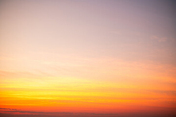 Sky,sunset, beautiful , luxury soft gradient orange gold clouds and sunlight on the blue sky perfect for the background, Sunrise on morning or evening in winter warm time ,Twilight summer,silhouette