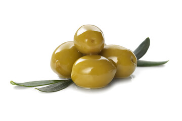 Delicious marinated green olives and leaves isolated on white