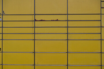 Close-up of Yellow Metal Surface with Rust