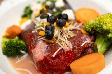 BARF diet for dogs or healthy ingredients for nutritious cooking, keto, paleo, and carnivore diet. Biologically appropriate raw food. Organic feeding for pets. High protein canine nutrition.