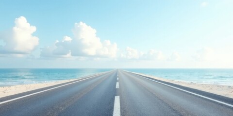 Fototapeta premium Asphalt Road Leading to a Serene Ocean Horizon Under a Bright Sky with Fluffy Clouds