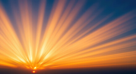 Obraz premium Majestic Sunset Rays Golden Hour Sky with Dramatic Sunbeams