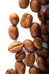 Color photo. Textured background. Coffee beans scattered on white background. Wallpaper. Cover. Postcard. Advertisement