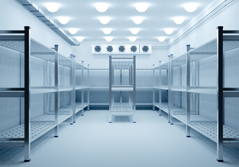 An empty industrial cold storage room with clean metal shelving and large ceiling cooling fans, designed for storing perishable goods in a temperature-controlled environment.