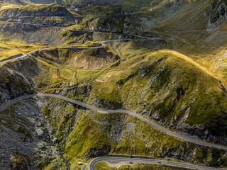 Aerial view of the Transfagarasan road in Romania. Curvy road through the Carpathian Mountains.