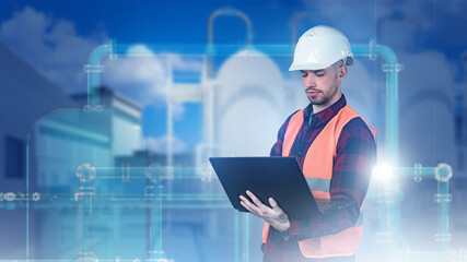 Man industrial engineer with laptop. Engineering communications design. Factory behind industrial...