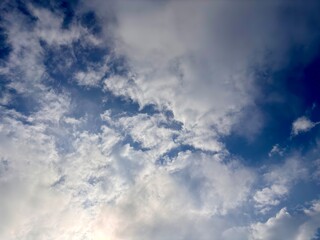 natural background, blue sky, thick clouds, beautiful natural gradations of the golden hour