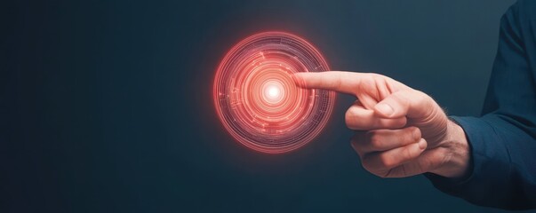 A hand points at a glowing red circular interface, symbolizing technology, interaction, and digital innovation against a dark background.