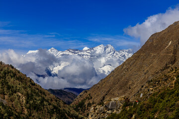 Nepal mountains landscape in Himalaya Everest Base camp trek. Beautiful landscape of snow summit eight thousand peaks above huge glacier and wide mountain valley Solo Khumbu, Sagarmatha Region