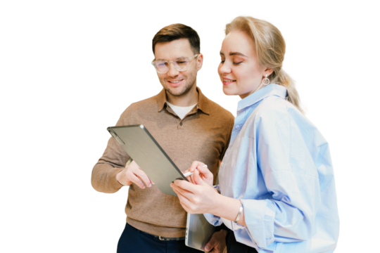 Colleagues collaborating on a project while reviewing documents in a modern office setting