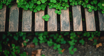Close-up view of wooden slats featuring intricate textures and surrounded by vibrant green plants creating a natural atmosphere