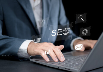 SEO Concept Businessman use laptop to analyze SEO search engine optimization for promoting ranking traffic on website and optimizing your website to rank in search engines. digital marketing.