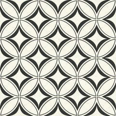 A seamless pattern of overlapping circles with a dark outline on a light background, creating a geometric design with diamond shapes in the intersections