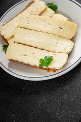 Sandwich soft cheese Camembert or Brie fresh delicious gourmet food background on the table rustic food top view copy space