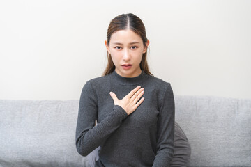 Acid reflux disease, suffer asian young woman have symptom gastroesophageal, esophageal, stomach...