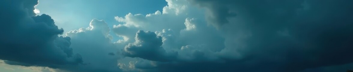 Fototapeta premium Imposing dark cumulus clouds dominate a stormy sky, heavy rain implied , overcast, dramatic
