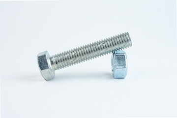 Steel bolt and nut on a white background