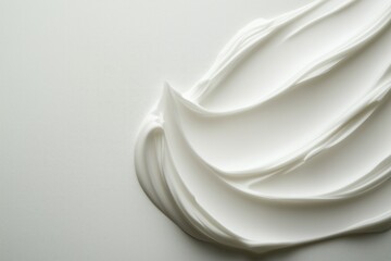 Texture of white cream surface. Smear of cosmetic cream. Abstract beauty background skin care cream, texture of cosmetic product, dairy product.