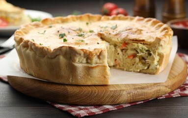 Delicious fresh homemade pie on wooden table, closeup