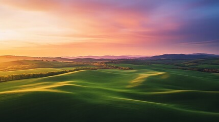 Obraz premium Serene Sunset over Rolling Green Hills