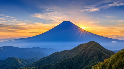 Fototapeta premium Majestic Sunrise Over Snow Capped Mountain Peak