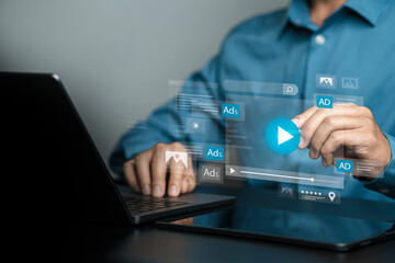Businessman using laptop with digital marketing advertising dashboard. Online sales concept, advertising products on website, promoting products or services through digital tools.