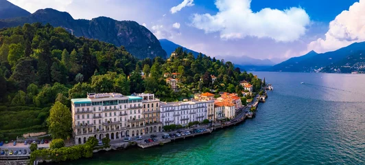 Fotobehang Lago di Como - beautiful famous lake in northen Italy, Lombardy region. Panoramic drone high angle view of scenic Tremezzina village . Italian romantic travel destinations © Freesurf