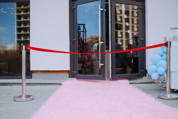 Grand Opening with Red Carpet and Pink Fur Runner at Event Venue