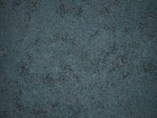 Close-up of dark cement with cool grey patches and smooth finish, offering a distressed look.