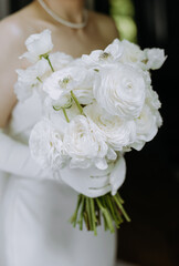 Elegant Bridal Bouquet of White Flowers with Pearls and Gloves