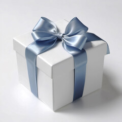 Obraz premium Satin or silk blue ribbon with a bow on a gift box, decoration element. Gift isolated on white background. Simple minimalistic design