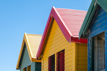 colorful beach houses, bathing boxes, change cubicles, at Muizenberg