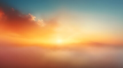 Obraz premium Sunrise over a hazy, misty landscape