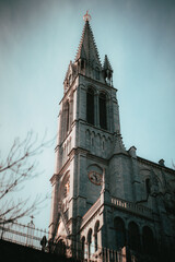 Gothic Church Tower with Clock and Spire