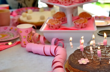 Festive Birthday Celebration with Chocolate Cake and Pastries