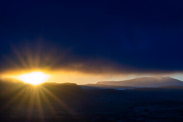 Spectacular sunrise over mountains and landscape