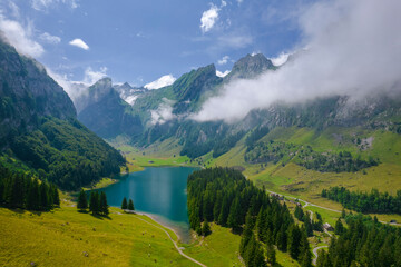 Fototapeta premium Aerial of beautiful mountain lake Seealpsee in Alps of Switzerland Sunny summer day