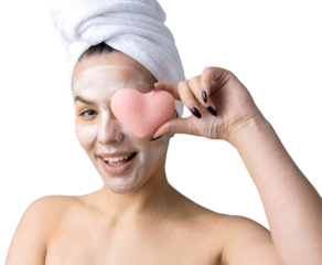 Beauty portrait of woman in white towel on head  with a sponge for a body in view of a pink heart. Skincare cleansing eco organic cosmetic spa relax concept.